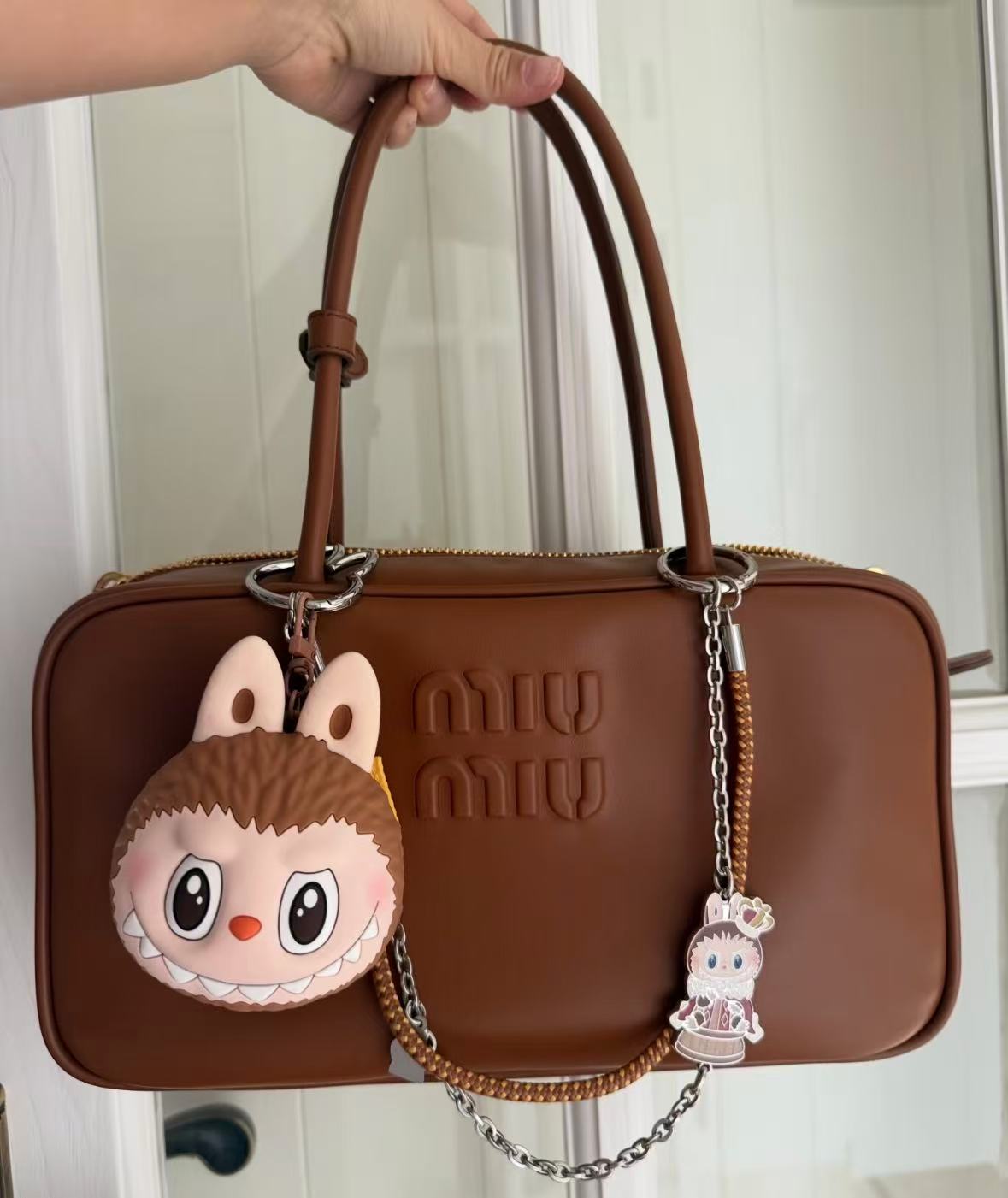 LABUBU Originals-Brown Silicone Earphone Bag by POP MART