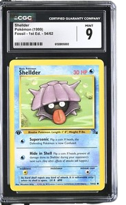 CGC 9 SHELLDER 1ST ED FOSSIL